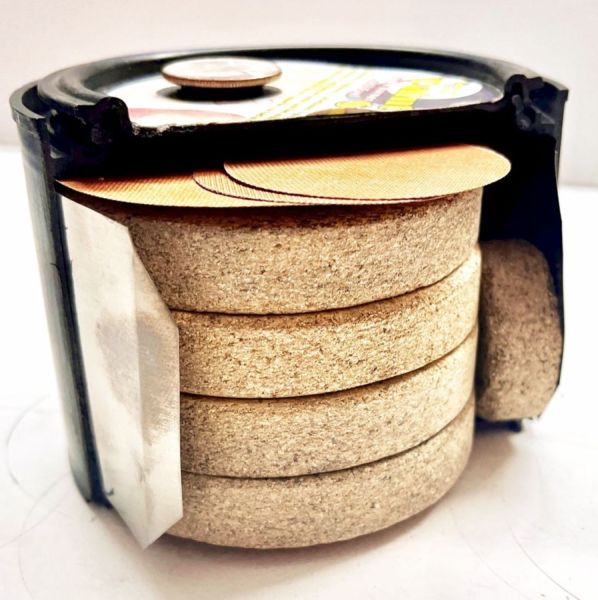 Cutaway of the PaintCan Stones Stove showing the stack of Stones and ground patches inside the can